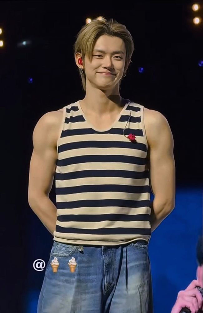 Concert YJ. Striped tank top & baggy jeans. Arm muscles out. Smiley YJ!!!!!!!!