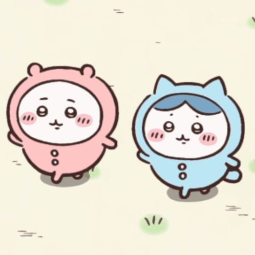 two cartoon characters one pink and one blue are standing next to each other in the grass