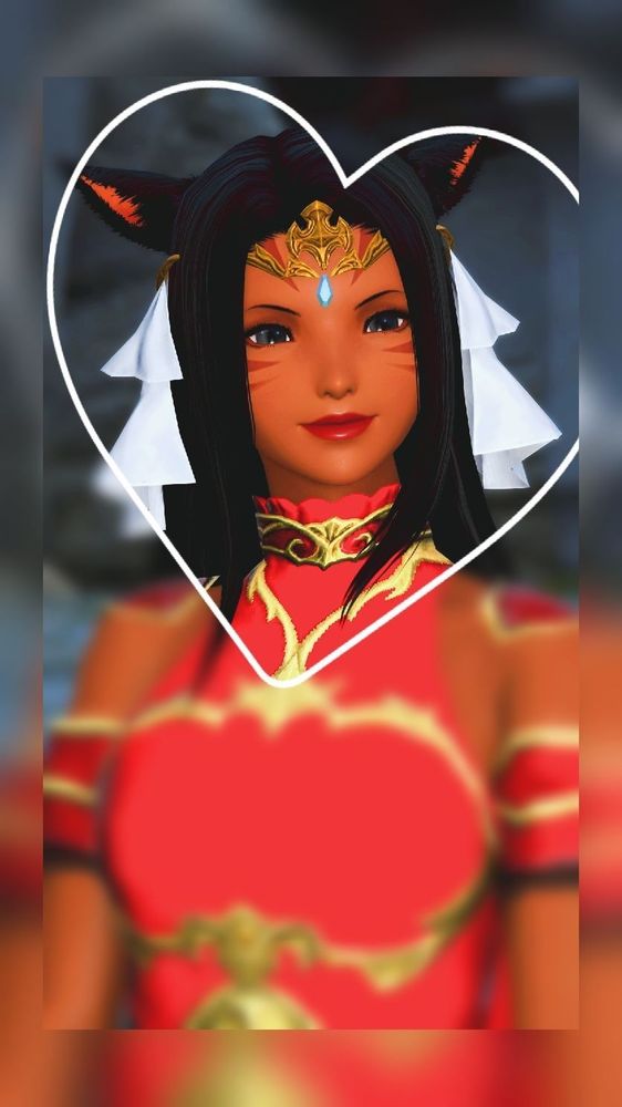 A portrait shot of Annette, her face in focus inside of a white heart with the rest of the image out of focus