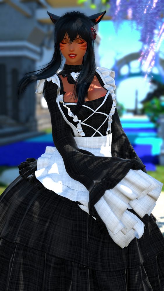 Annette dressed as a maid, posed outside club siren 