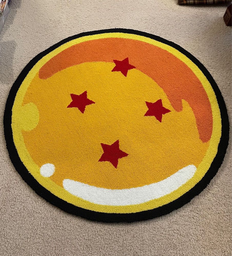 Photo of a rug with the design of a 4 star Dragon Ball