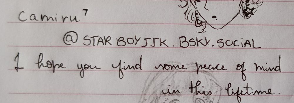 Folha de caderno com o nome, user e biografia do usuário @starboyjjk.bsky.social escrito a mão