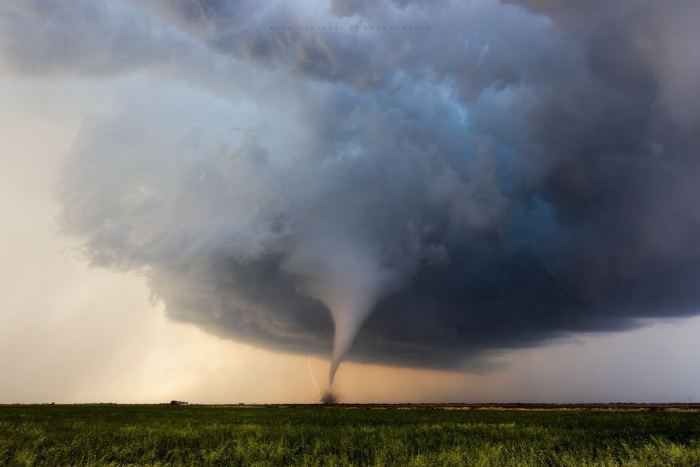White tornado in a grassy field 
