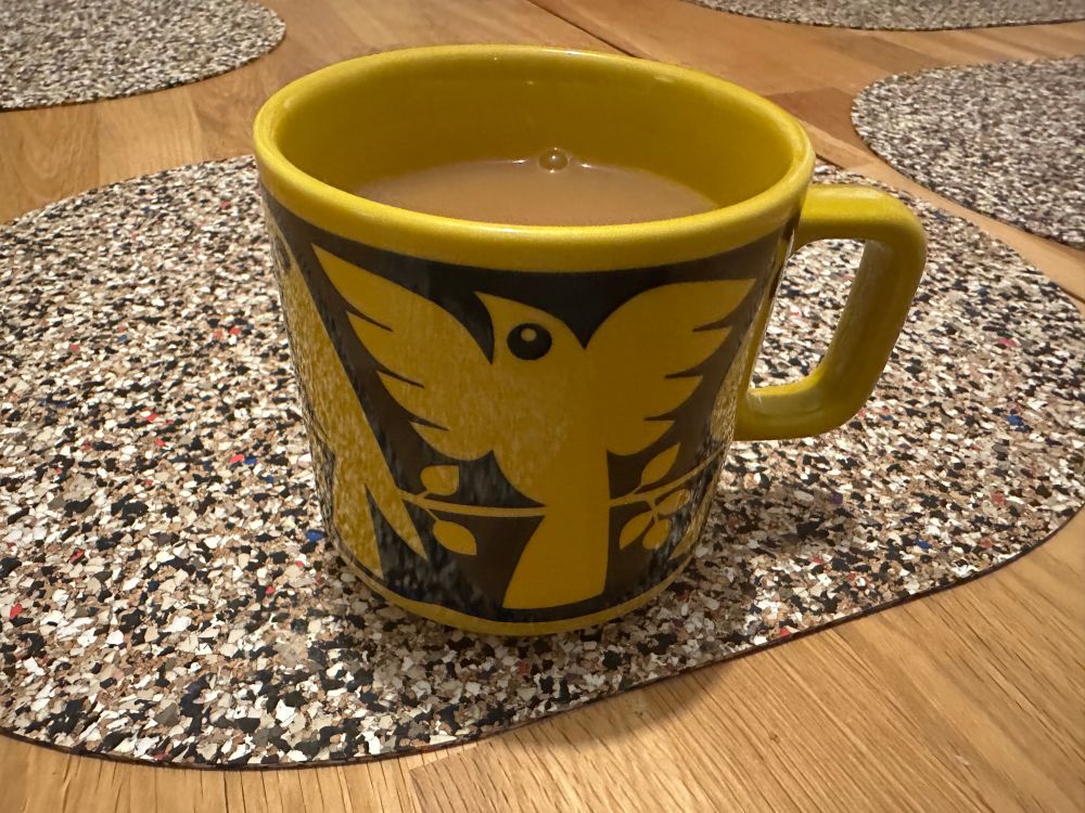 Hornsey Birds on a Branch mug filled with tea