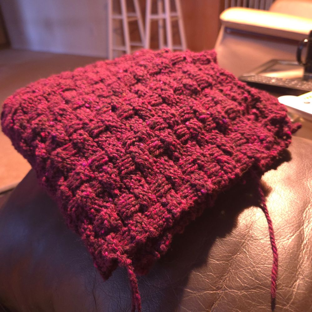 Maroon basketweave knit panel for poncho.