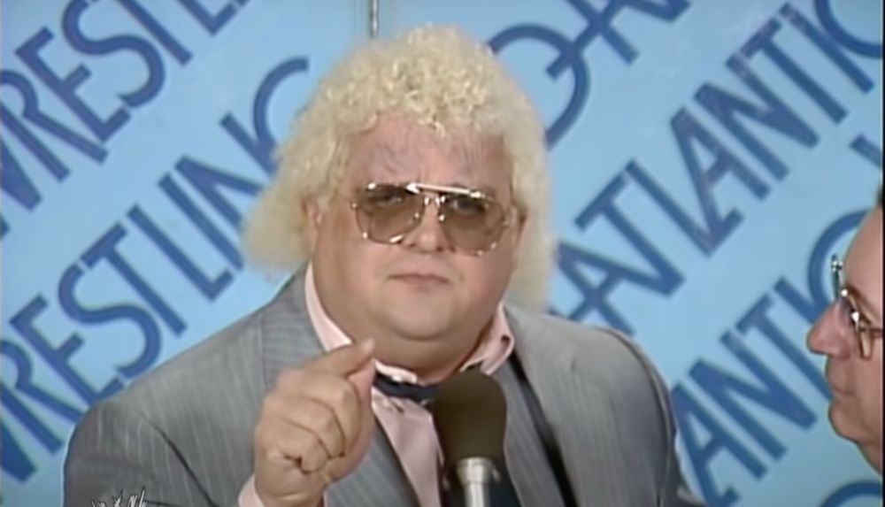 Dusty Rhodes cutting the Hard Times promo.