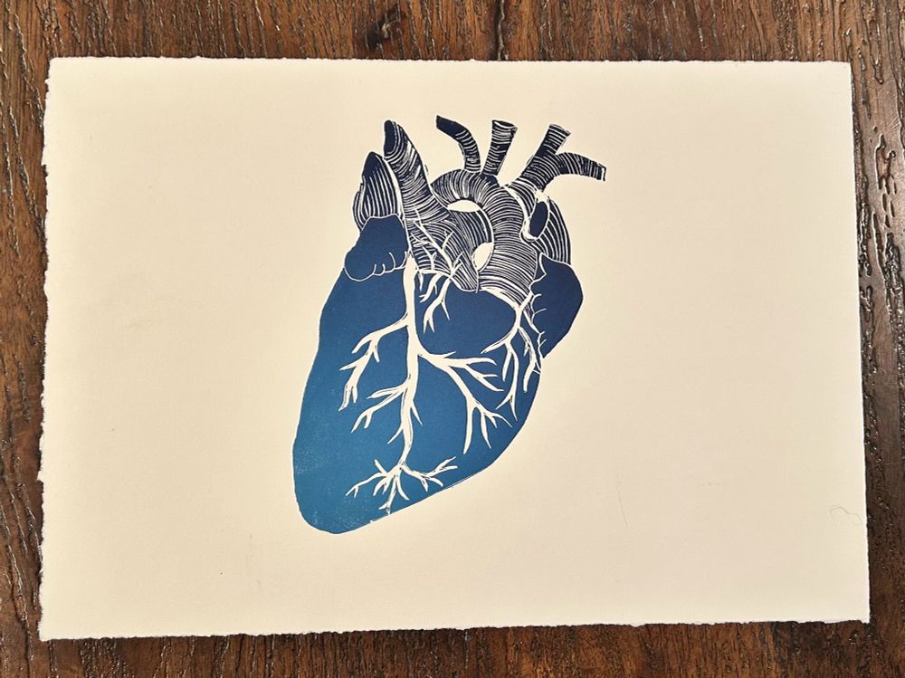 A backwards linocut print of the human heart with some anatomical inaccuracies that will forever haunt the creator 