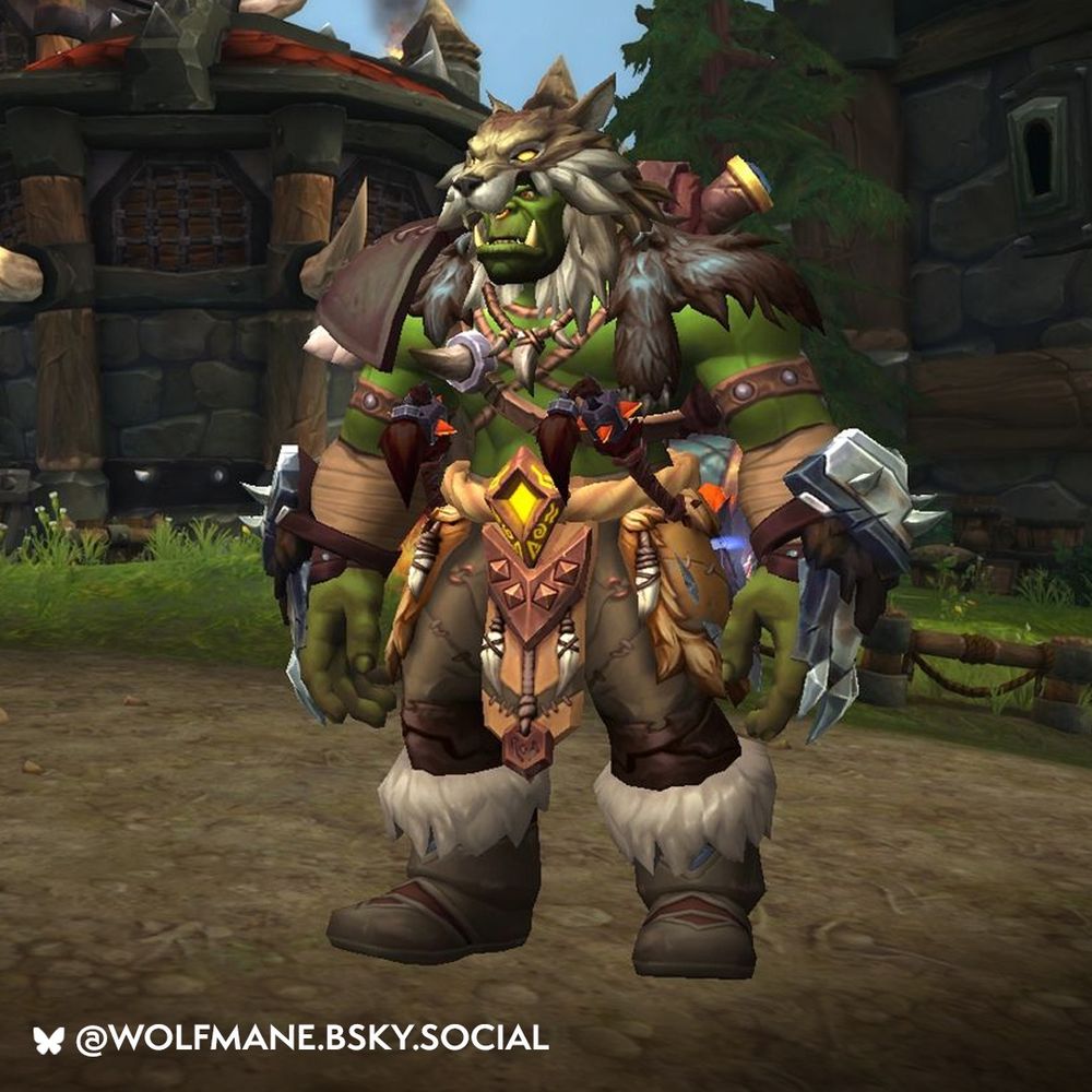The character at the center of the image is an orc with bright green skin and a stocky build. They wear a wolf helm that hides most of the upper half of their face. On one shoulder is a pelt; on the other shoulder is a large leather pauldron. Across their torso are multiple ropes that have bones tied to them. On one hip is a black and orange mace. They also wear a belt with a large orange diamond-shaped buckle in the center. Their cloth pants appear to have many seams and stitches visible. They wear fur-lined boots that match their pants. The Orc stands on a dirt road with Horde-style buildings and greenery in the background. They face toward the left side of the image, obscuring part of their face with the wolf helm.