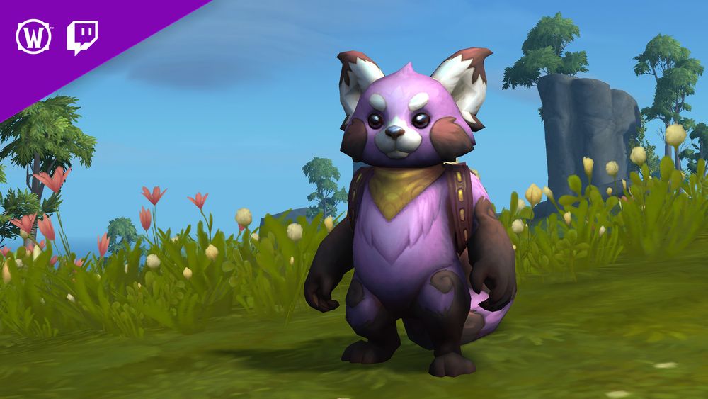 At the top left corner, there is a banner with the World of Warcraft circle logo next to the Twitch logo. In the center of the image, there is a small furry creature that resembles a red panda. The fur is a bright purple and pink mixed together. It has some white fluffy hair around the mouth, on the ears, and eyebrows. It is wearing a bright yellow handkerchief around the neck and has brown leather straps around its shoulders that appear to be a kind of backpack. There are spots of brown fur on the top of its ears, and its arms have the same color of brown fur throughout. There is brown fur at its feet and a little on its tail. The background of the image shows tall green grass, with some small white flowers sprinkled throughout. Behind that, there is a large mountain with a green tree in the distance.