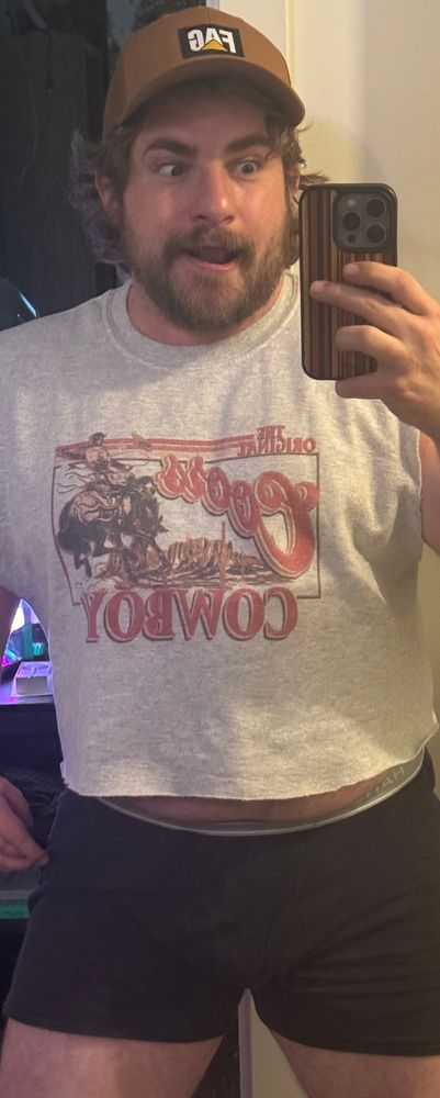 Very goofy man in slutty clothes 