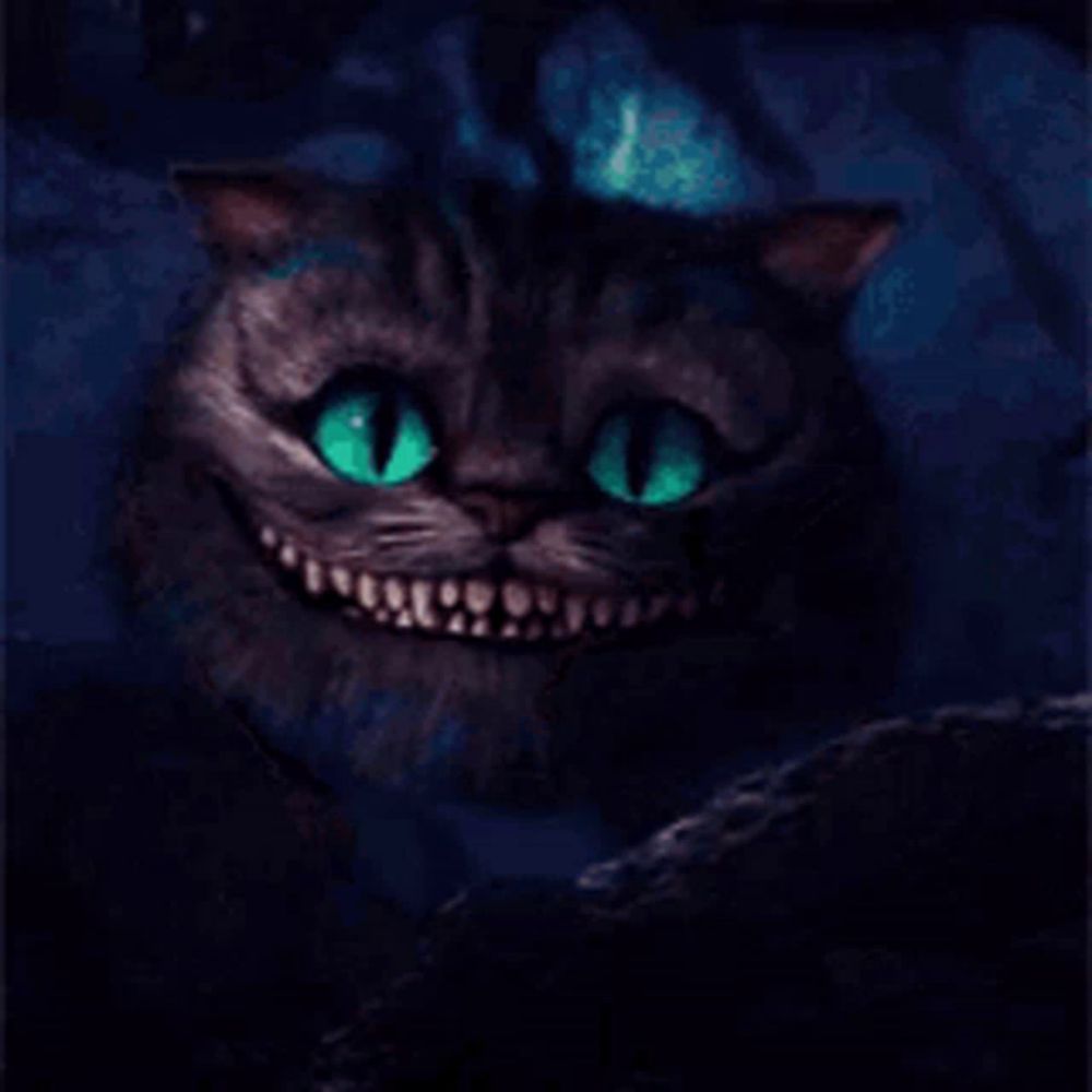 a cheshire cat from alice in wonderland with green eyes