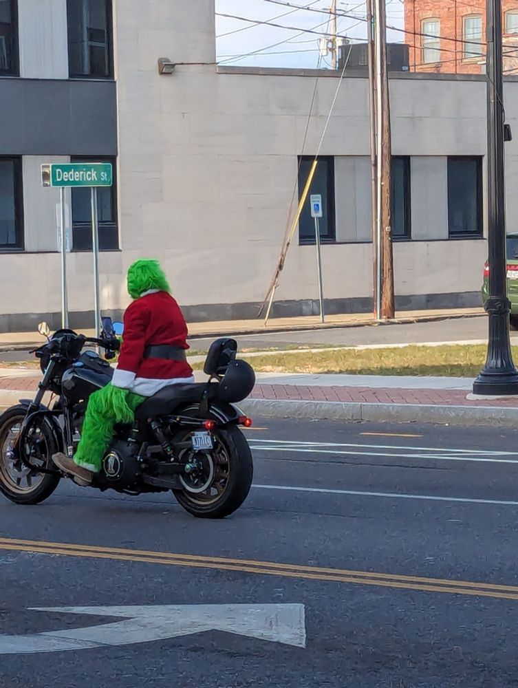 Grinch on motorcycle.