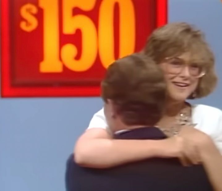 A player picks up Laurie Hendler after winning $10,000