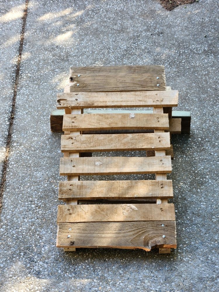 Top view of the ramp, there is no symmetry here.

I will not be winning any carpentry awards for this, but definitely got some cool uncle points 