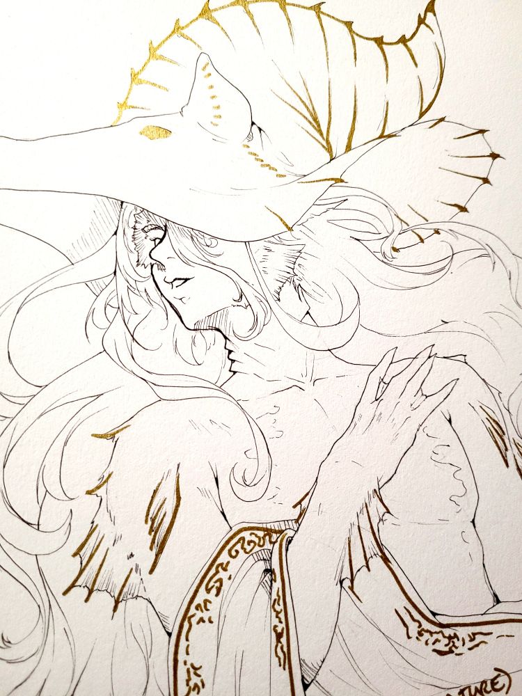 Another angle and close-up of the detailed illustration, showing off the shine of the gold ink. 