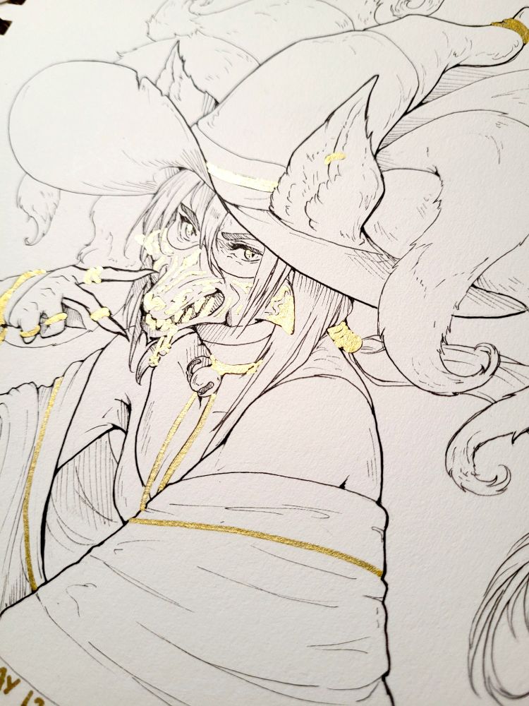 Another angle and close-up of the detailed illustration, showing off the shine of the gold ink. 