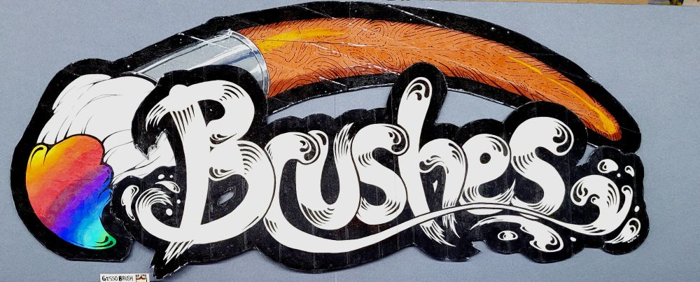 A large hand-painted sign cutout stating "Brushes" in a swirly font style, with a larged painted brush behind the letters. 