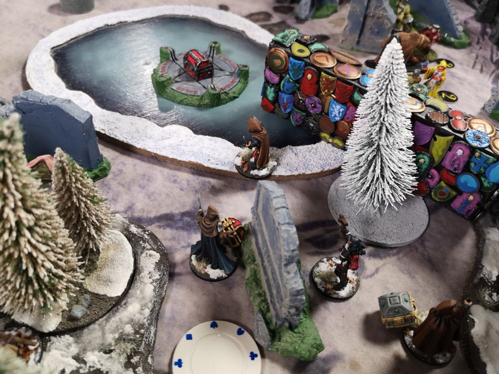 My theives approach the central treasure in the middle of the lake, while Rich tries to impede their progress with the use of the Wall spell