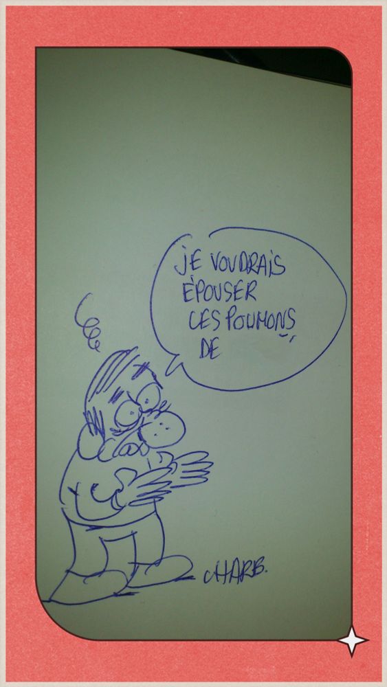 Dédicace signée de Charb "je voudrais épouser les poumons de" le nom de la personne a été effacé