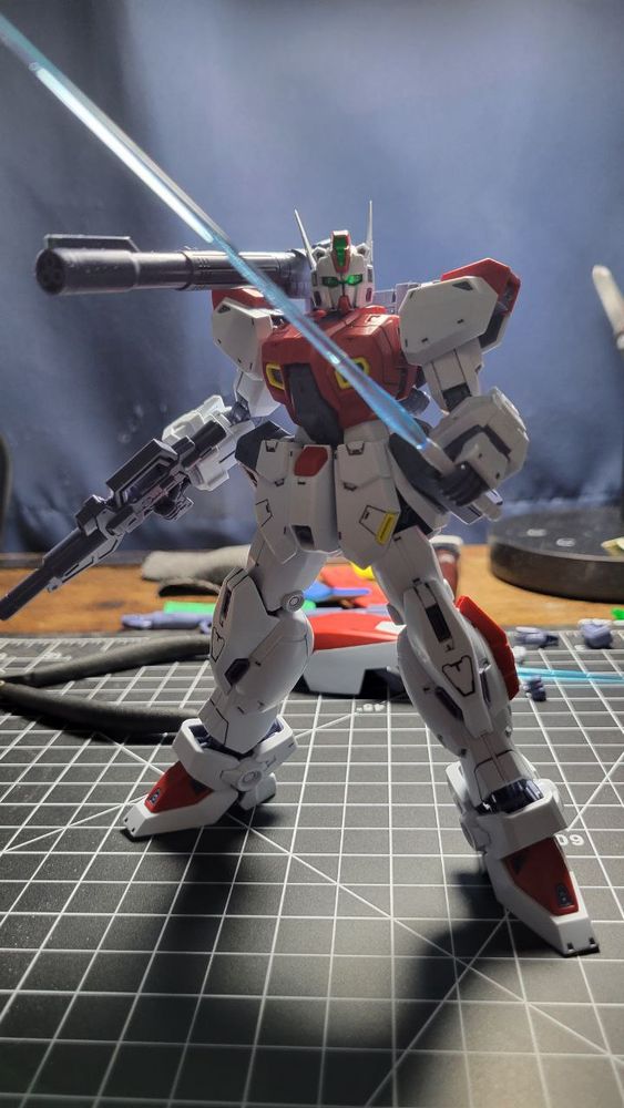 gunpla mg gunraid holding beam rifle and beam saber