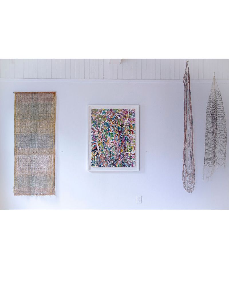 From left to right 
1. MICHELLE YI MARTIN, “Open Grid,” 2023, monofilament, cotton, metallic thread, silk, paper, wool, 72 x 34 inches, courtesy of the artist.	
2. JOHANNA ST. CLAIR, “Tangled Trees,” 2022, acrylic ink and watercolor ink on paper, 30.5 x 40 inches, courtesy of Gallery 16.
3. MICHELLE YI MARTIN, “Copper Holloway,” 2024, copper, cotton, 74 x 11 inches, courtesy of the artist.
4. MICHELLE YI MARTIN, “Nightshape,” 2025, monofilament, silk, wool, 61 x 15 inches, courtesy of the artist.