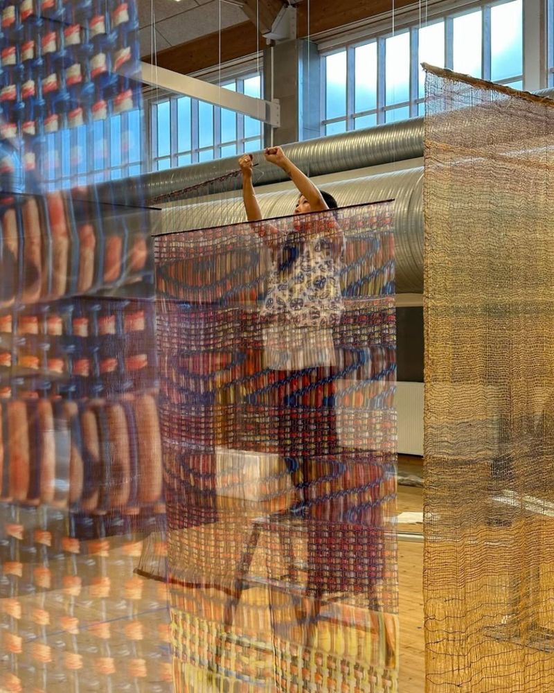 Photo of Michelle Yi Martin installing her work at The Copenhagen Contemporary for The Biennale for Craft and Design. Courtesy of the artist. 
