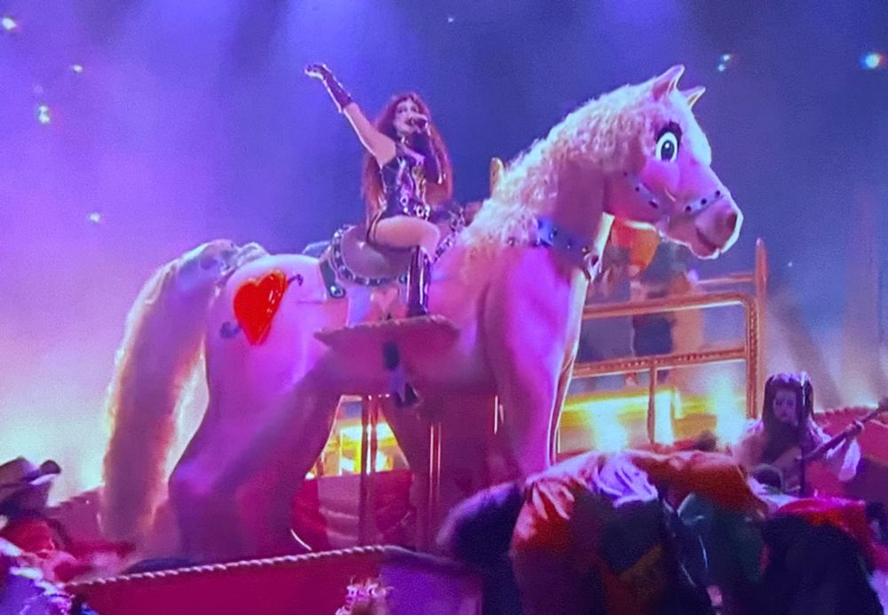 Chappell Roan on a pink pony performing at the Grammys 