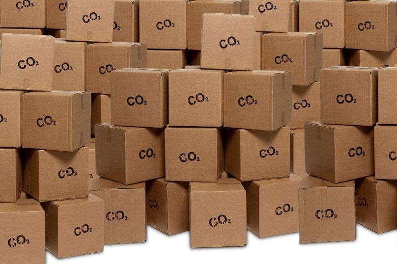 Multiple stacks of cardboard boxes, each labeled with "CO2.
