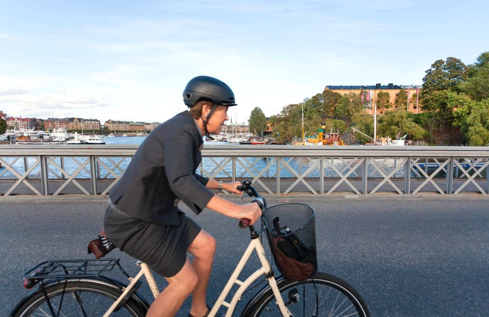 A woman riding a bicycle in Stockholm, Sweden, on September 14, 2018.