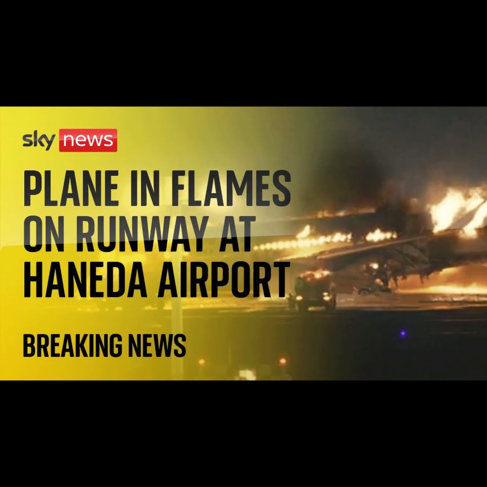 Watch live: Emergency crews respond to plane on fire on runway at Haneda airport in Tokyo