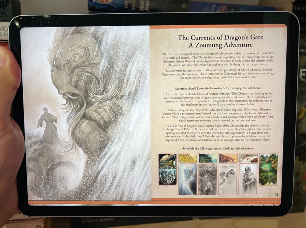 An iPad showing the intro page for The Currents Of Dragon’s Gate: A Zoumung Adventure. The illustration shows a character in Chinese-inspired garb looking up at a massive fish dragon looming out of a waterfall, with arms crossed in an intimidating fashion.