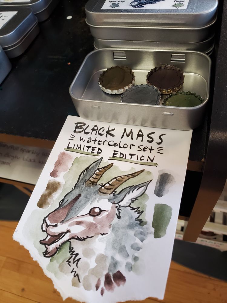 Handwritten sign for the Black Mass set featuring a drawing of a goat to swatch colors over.