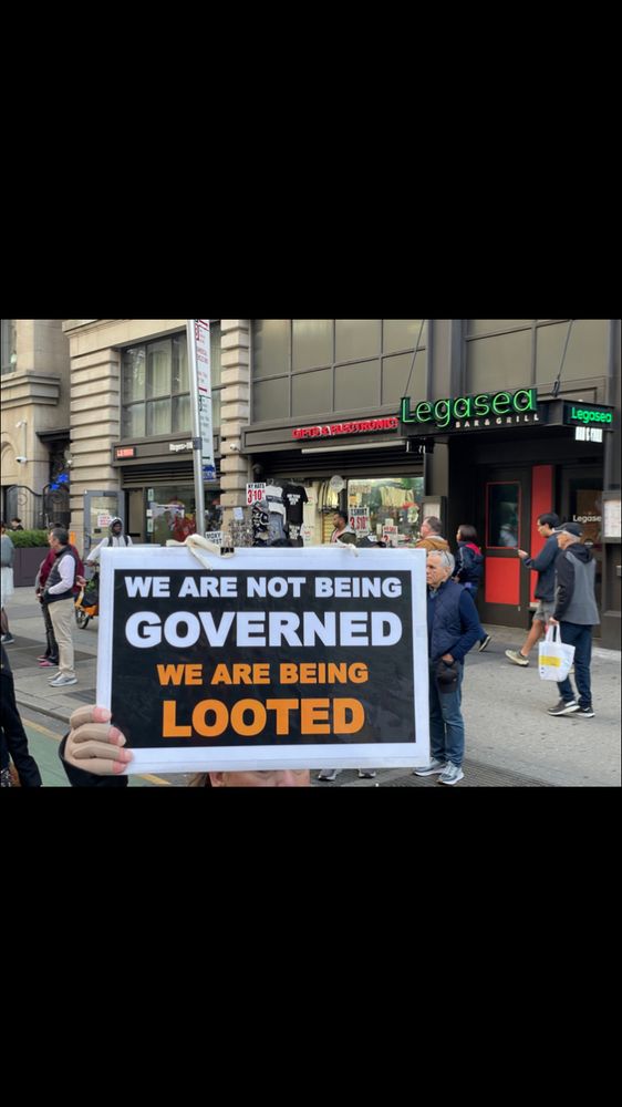 Sign at a protest that reads “We are not being GOVERNED 
we are being LOOTED.”