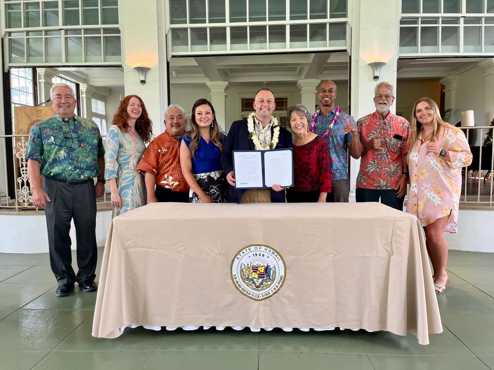 A smaller group of advocates and officials with Governor Green after he signed HB862 into law. The bill diversifies the transportation option available to bring public school students too and from the classroom to address our school bus driver shortage.