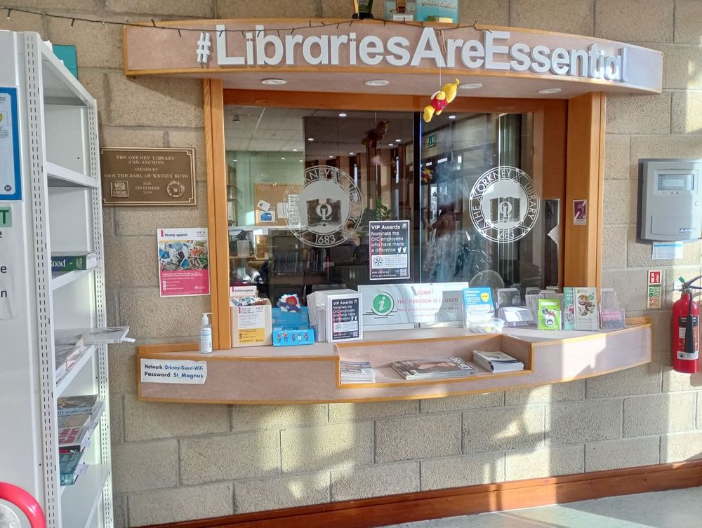 Libraries are essential banner above the reception area in Orkney Library Kirkwall