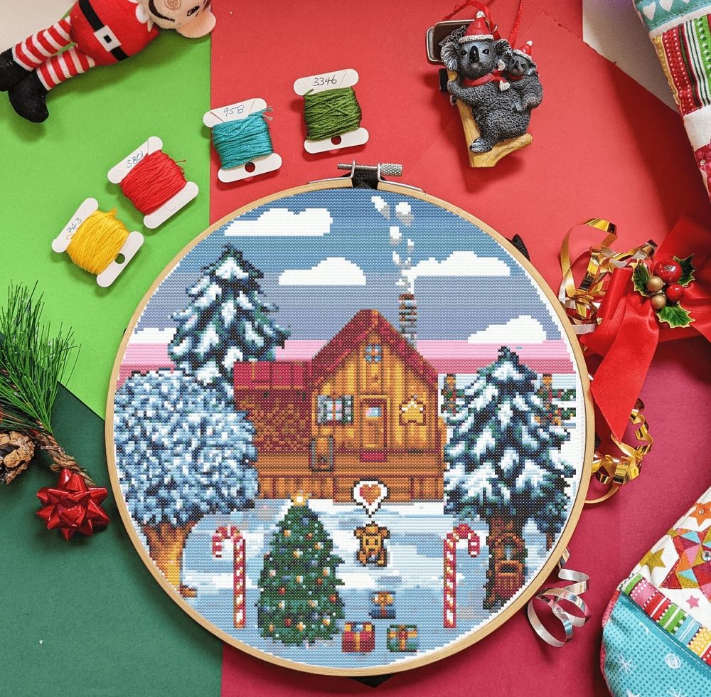 cross stitch design of winter in stardew valley