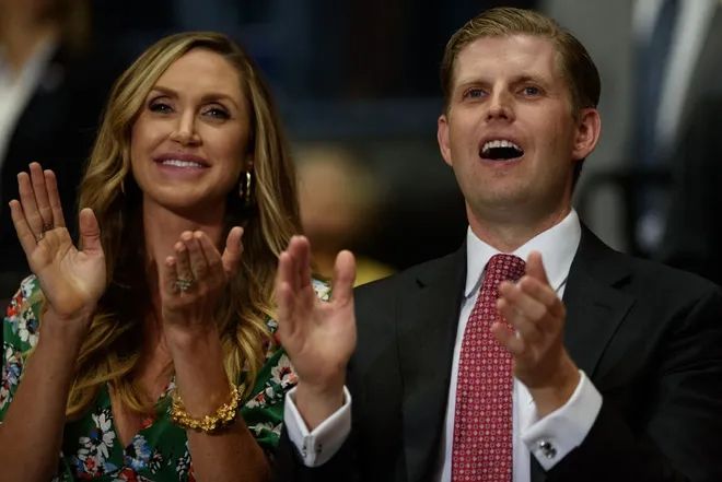 Lara and Eric Trump clapping