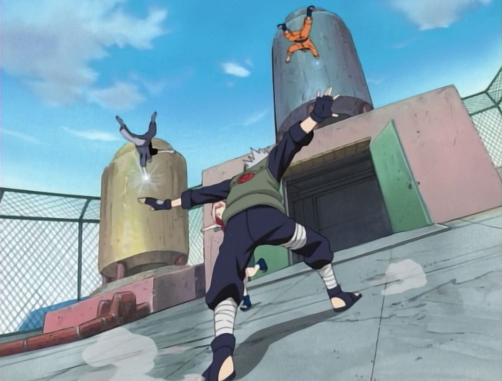 Kakashi throwing Naruto and Sasuke towards water tanks, he has a wide stance and his arms are pushed back from the effort, dirt rising by his sides. Naruto and Sasuke both have their respective jutsu in their hands, Sakura is barely seen running in front of Kakashi.