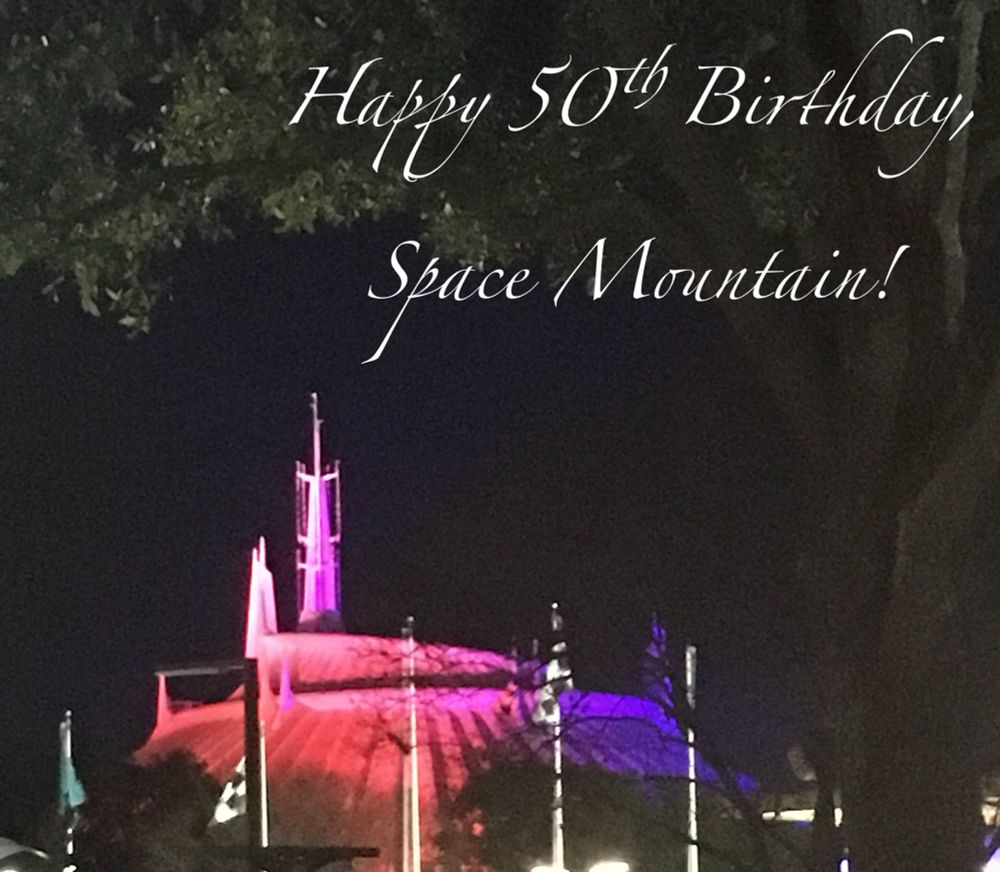 Image of Space Mountain in Disneyworld at night. Text added to image wishing the indoor rollercoaster attraction a Happy 50th Birthday.