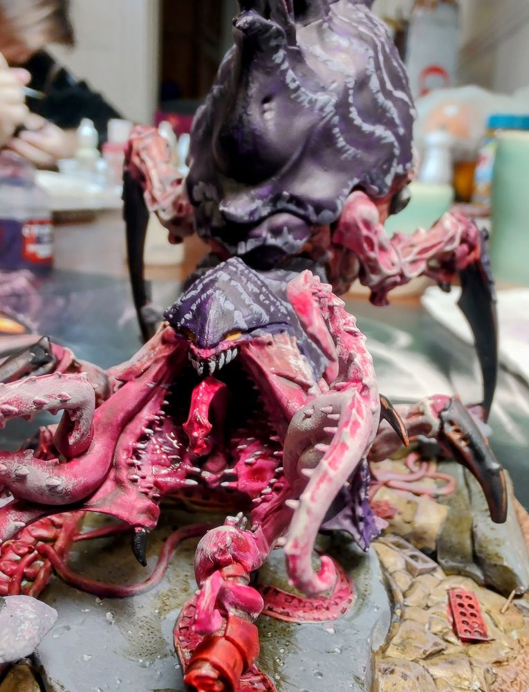 A tyranid psychophage monster miniature, mouth agape 
