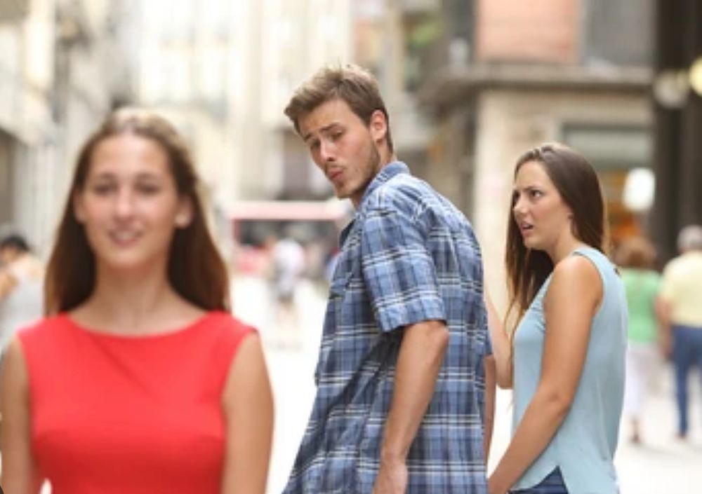It’s the meme of the guy looking at a girl and his girlfriend is like EXCUSE ME