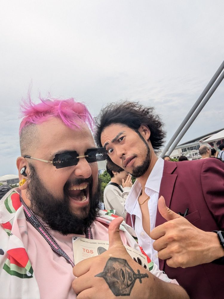 A selfie of myself and someone cosplaying as Ichiban Kasuga