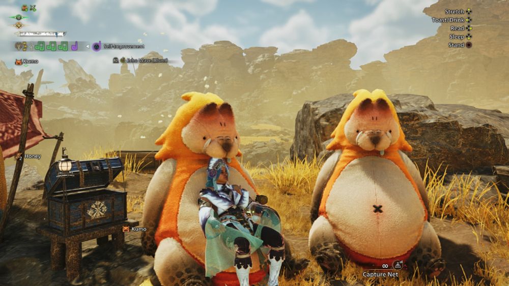 my monster hunter wilds hunter relaxing at a campsite while sitting in one of the two doshaguma plushie chairs