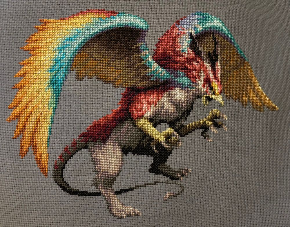 The Ogre Eagle boss sprite from Octopath Traveler (2018) cross stitched on 14ct grey aida.