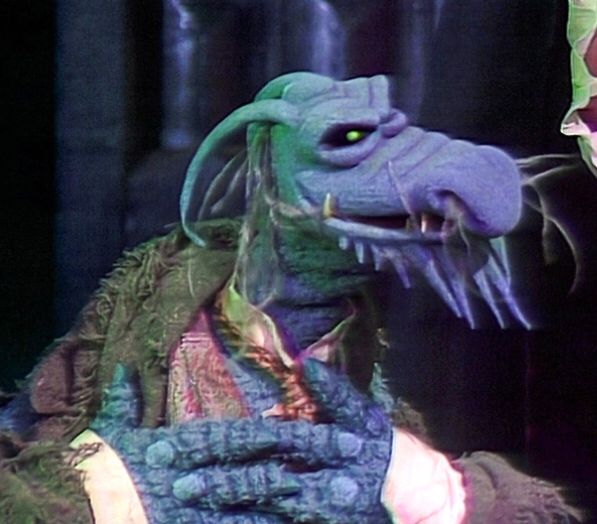The blue skeletal dragon and fashion expert Muppet, Uncle Deadly. Similar spikes, tendrils and snouts! 