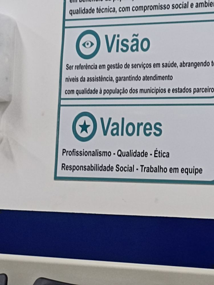 Cartaz de UBS listando a Missão, Visão e Valores do lugar
O ícone de Valores é um anel com uma estrela no meio, similar ao "Red Star Ring" de Sonic The Hedgehog 