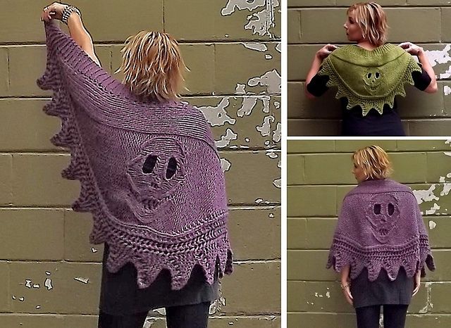 3 photos. Back view of a very chuky purple wrap with a skull motif knit into the center of the design. Also a view of a lesser chunky version in green. In all photos, I'm standing in front of a olive green wall with chipped paint.