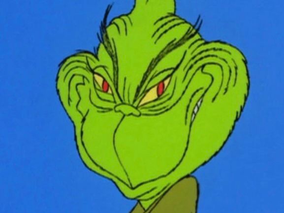 Grinch grinning evilly but more zoomed in. 