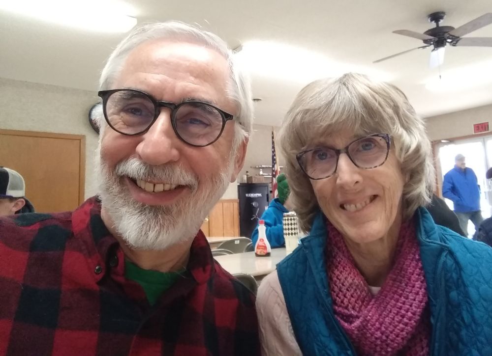 Tom O'Donnell and Gwen Pedrick pose for a photo.