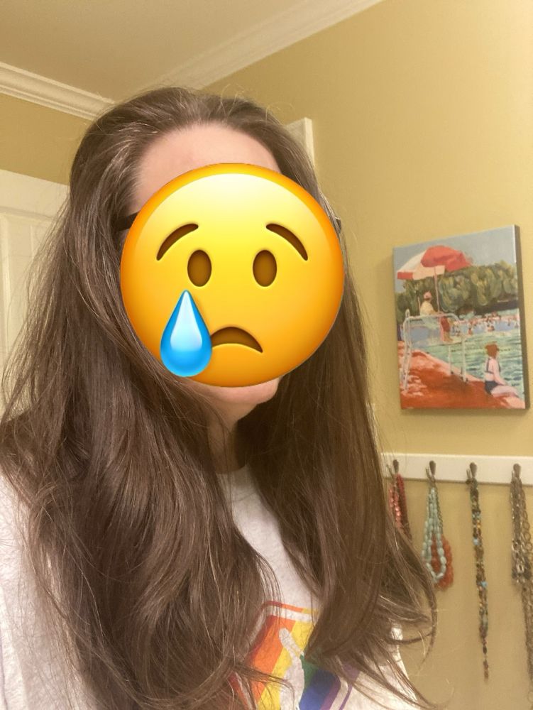 Woman with long, thick, brown hair 